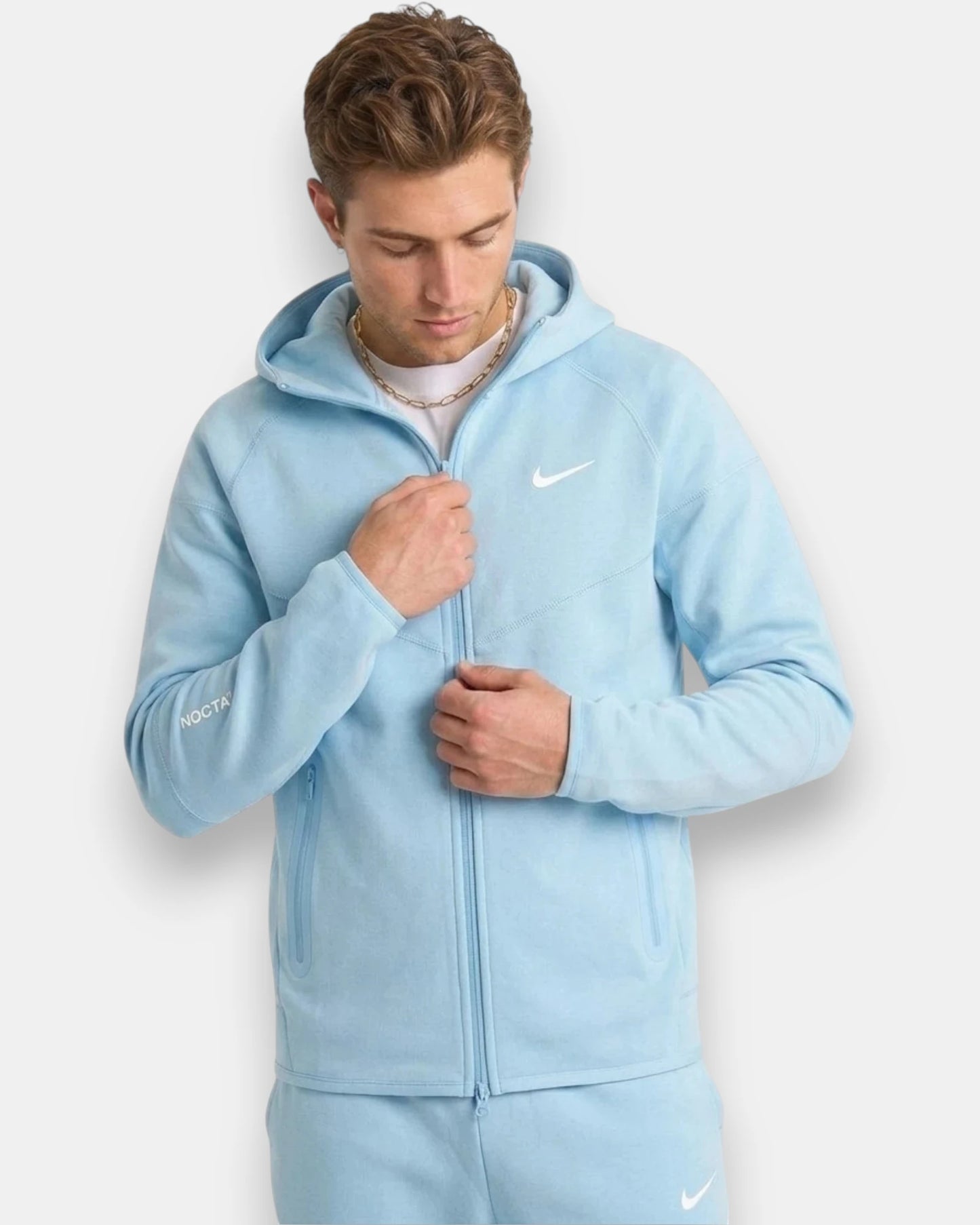 NOCTA Tech Fleece baby blue hoodie and jogger