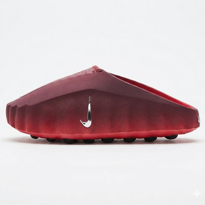 Red sandal with a Nike logo on a white background